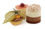 Selection of mini desserts made with Belgian chocolate 12 each of: double chocolate mousse, white chocolate & raspberry mousse, chocolate & orange tartlets