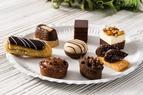 A chocolate based buffet selection including Chocolate and Coffee Tartlette, Pecan Nut Brownie, Chocolat Ganache Financier, Chocolat Banana Moelleux, Chocolat Eclairs, Chocolat Entremet, Croustillant Chocolat, Chocolat Fondant
